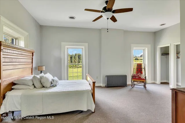 a front view of a building with garden