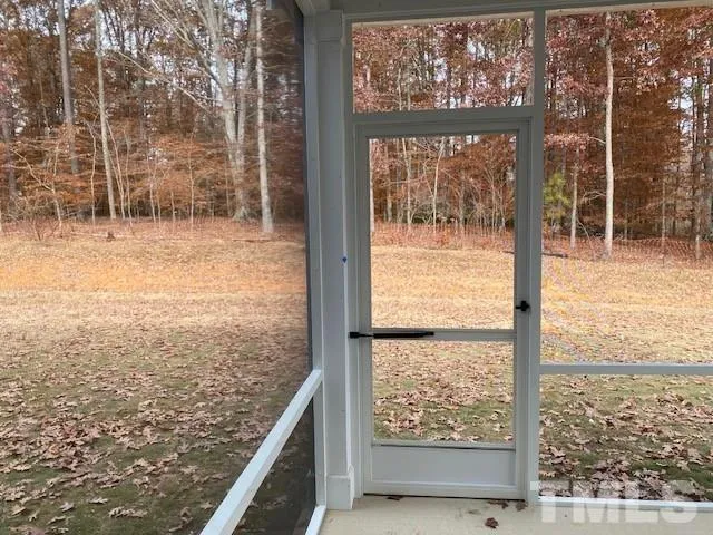a view of a glass door with a window