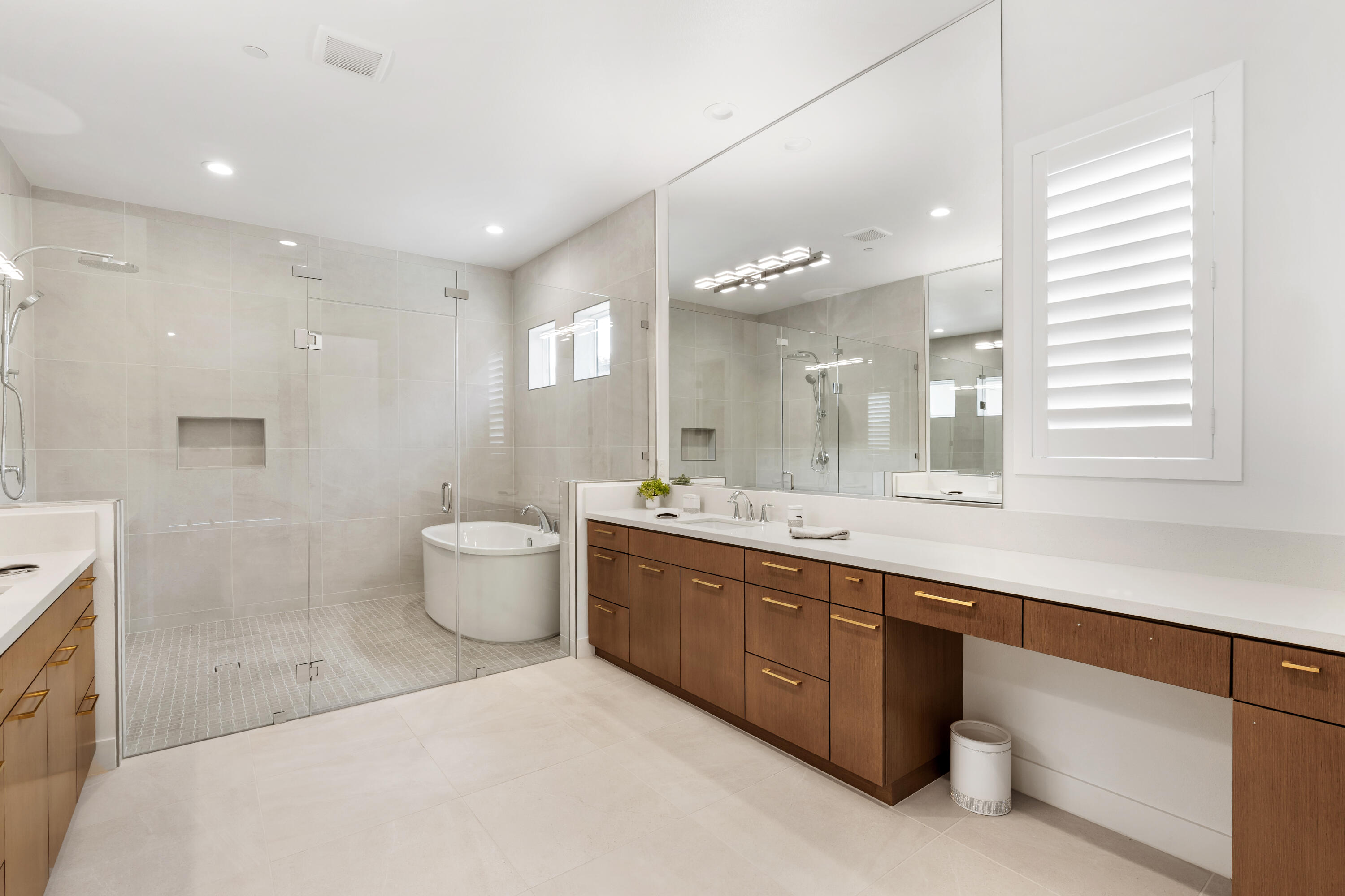 80404 Old Ranch Trail South La Quinta, CA 92253 - Photo 14 of 28 a bathroom with a double vanity sink toilet and a mirror