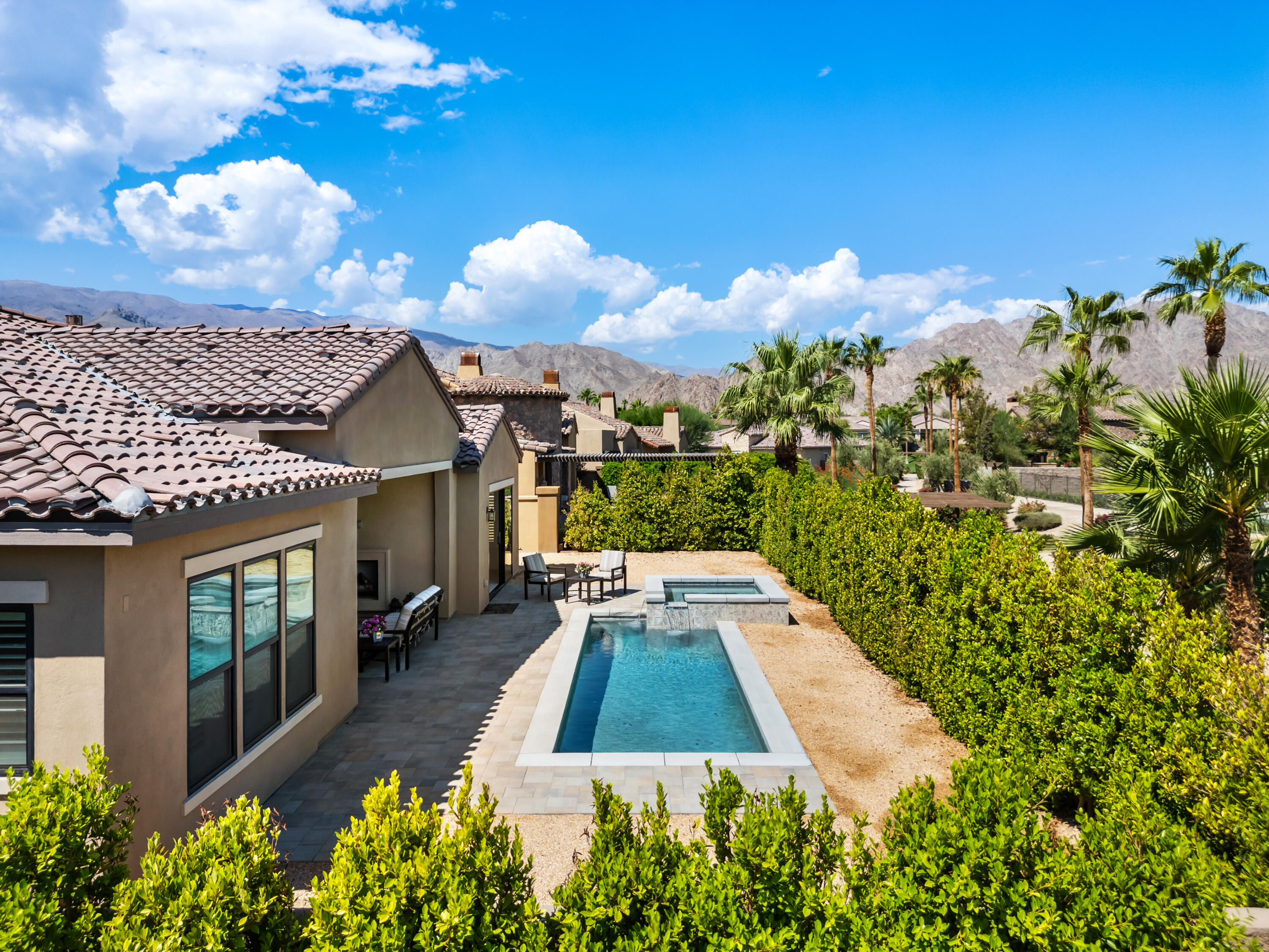 80404 Old Ranch Trail South La Quinta, CA 92253 - Photo 24 of 28 a view of a house with a swimming pool