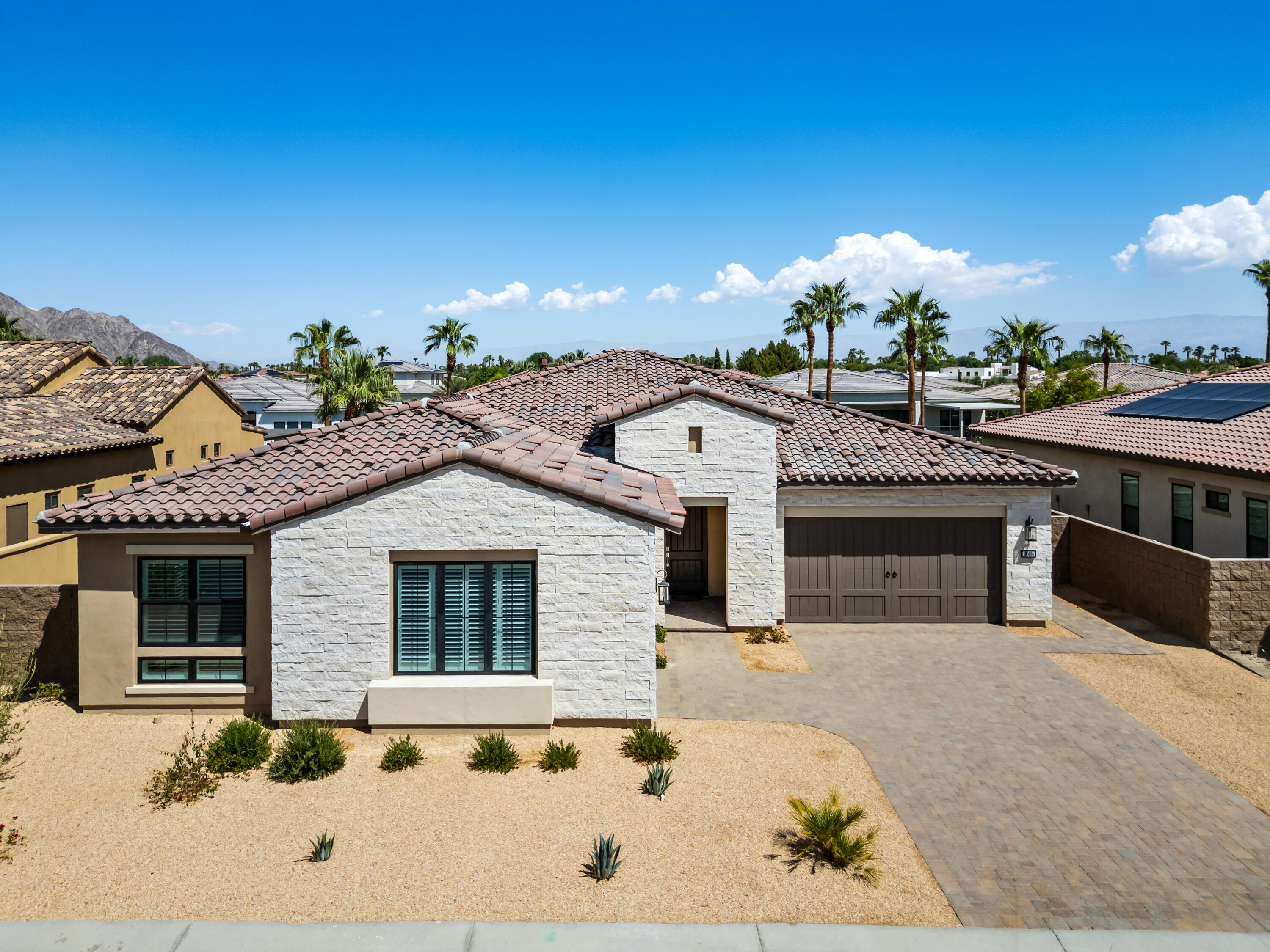 80404 Old Ranch Trail South La Quinta, CA 92253 - Photo 25 of 28 a view of a house with a swimming pool