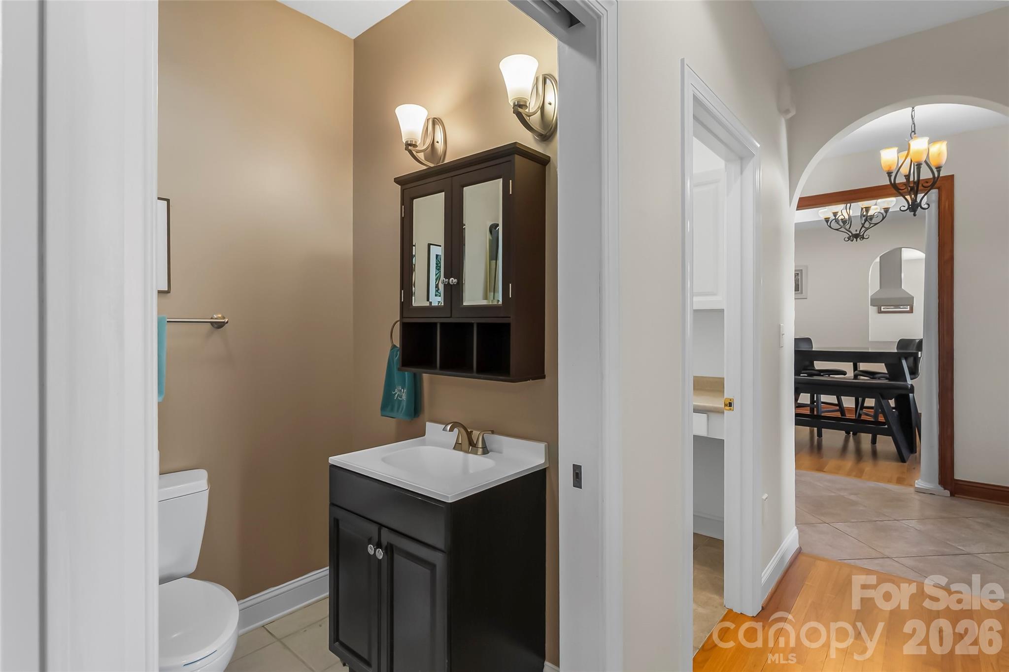 4639 Harbor View Terrace Morganton, NC 28655 - Photo 14 of 33 a bathroom with a sink a toilet and a mirror