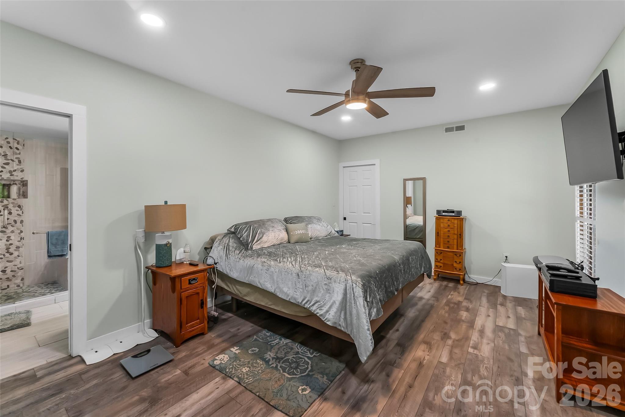 4639 Harbor View Terrace Morganton, NC 28655 - Photo 20 of 33 a bedroom with a bed and wooden floor