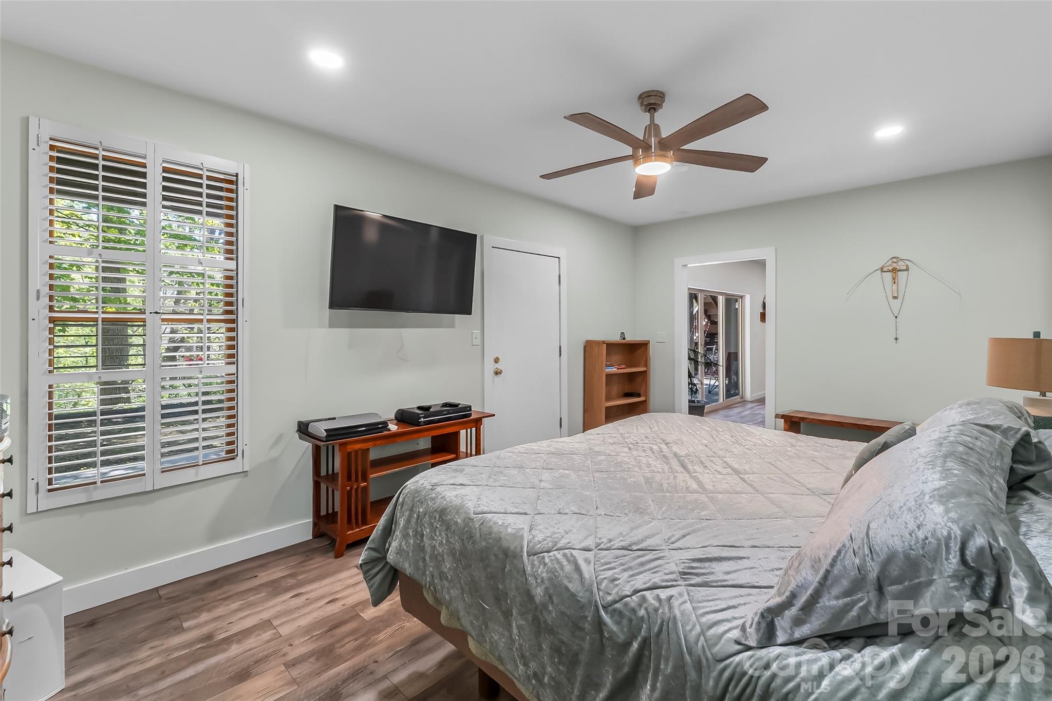 4639 Harbor View Terrace Morganton, NC 28655 - Photo 23 of 33 a bedroom with a bed and a flat screen tv