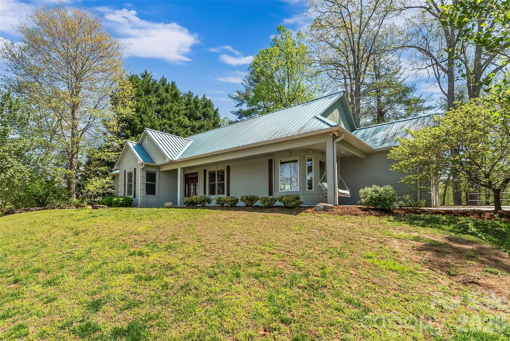 4639 Harbor View Terrace Morganton, NC 28655 - Photo 27 of 33 a front view of a house with a yard