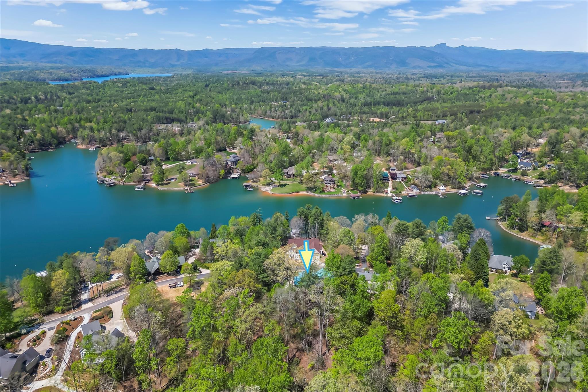 4639 Harbor View Terrace Morganton, NC 28655 - Photo 31 of 33 a view of a lake with houses in the background