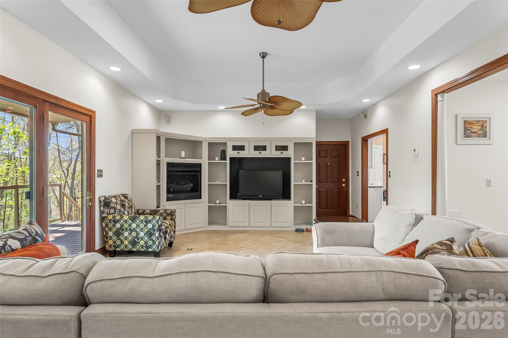 4639 Harbor View Terrace Morganton, NC 28655 - Photo 7 of 33 a living room with furniture and a flat screen tv