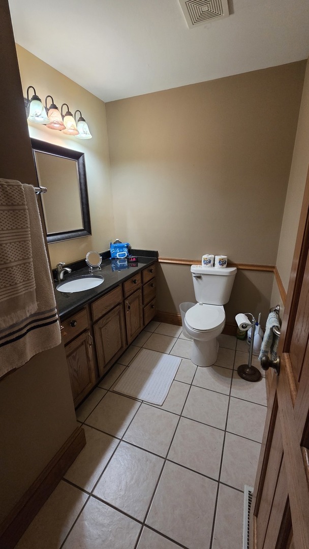2502 Van Drunen Lane Crete, IL 60417 - Photo 27 of 58 a room with a washing machine and a sink