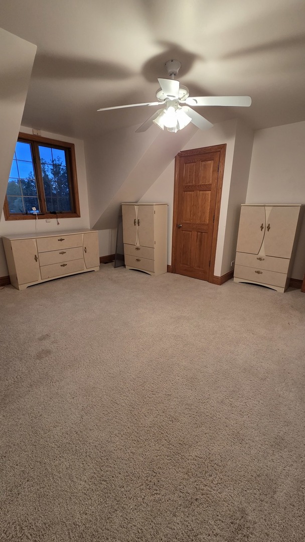 2502 Van Drunen Lane Crete, IL 60417 - Photo 40 of 58 a living room with furniture and a flat screen tv