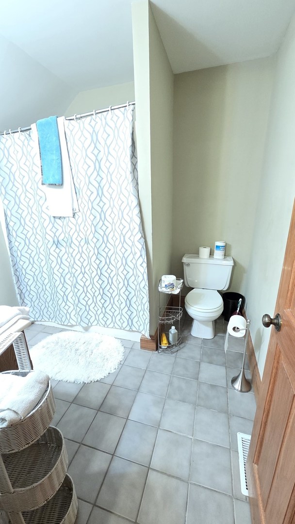 2502 Van Drunen Lane Crete, IL 60417 - Photo 44 of 58 a bathroom with a sink and a toilet