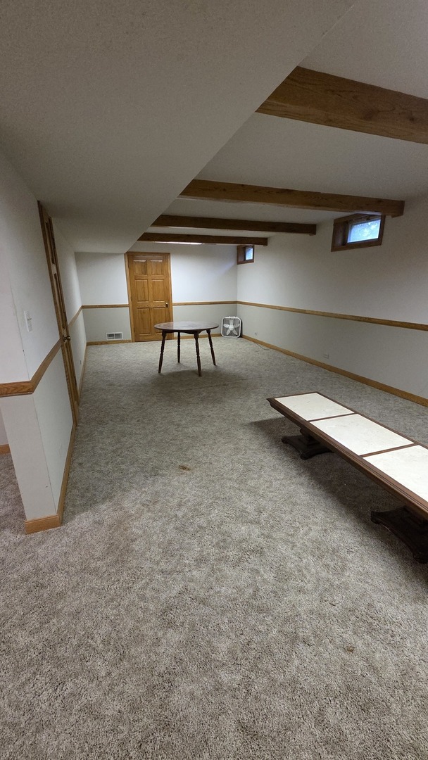 2502 Van Drunen Lane Crete, IL 60417 - Photo 51 of 58 a view of a livingroom with a staircase