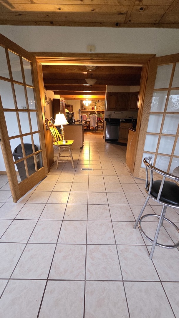 2502 Van Drunen Lane Crete, IL 60417 - Photo 7 of 58 a view of washer and dryer with kitchen