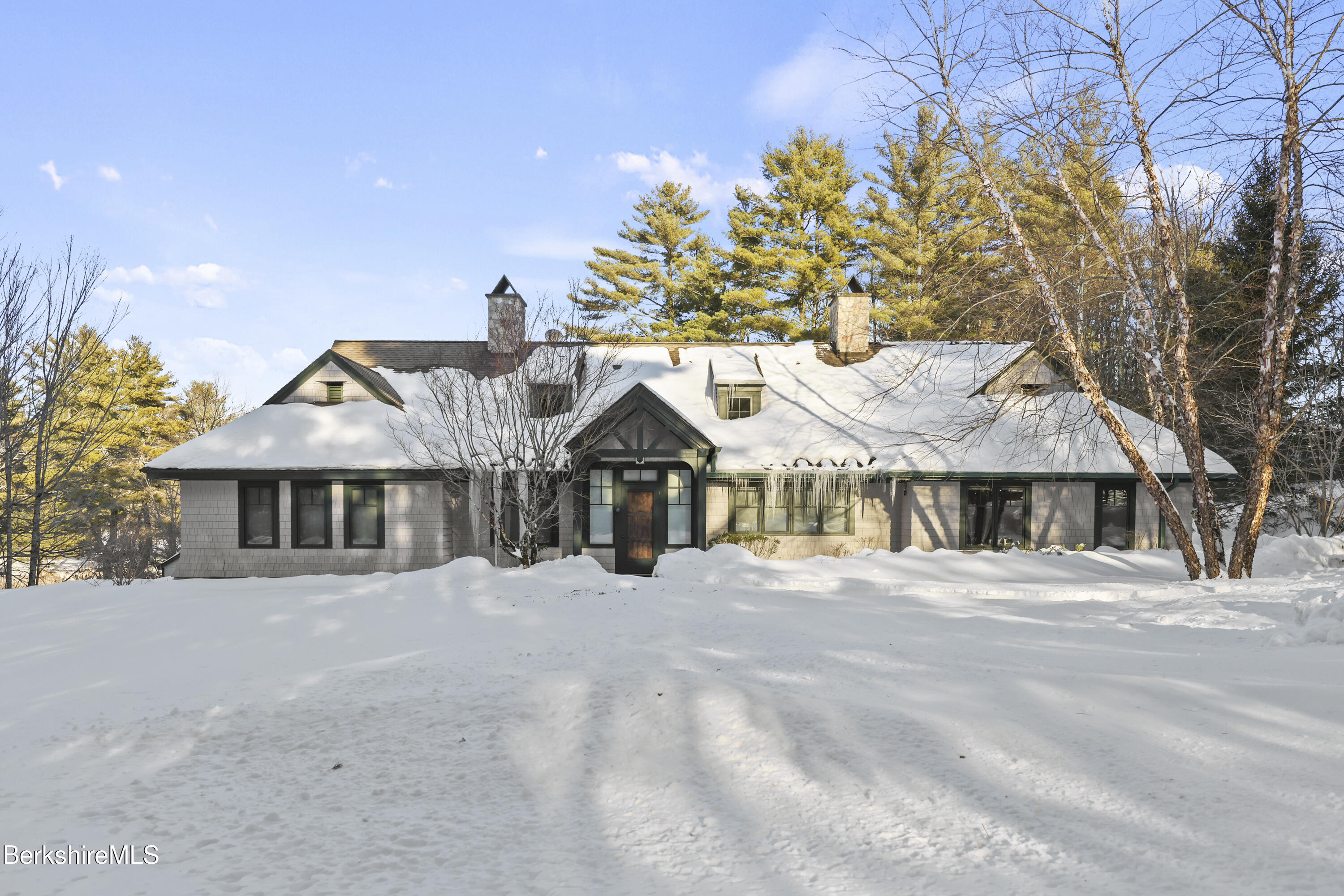 201 Stratford Road New Marlborough, MA 01259 - Photo 1 of 77 a front view of a house with a garden