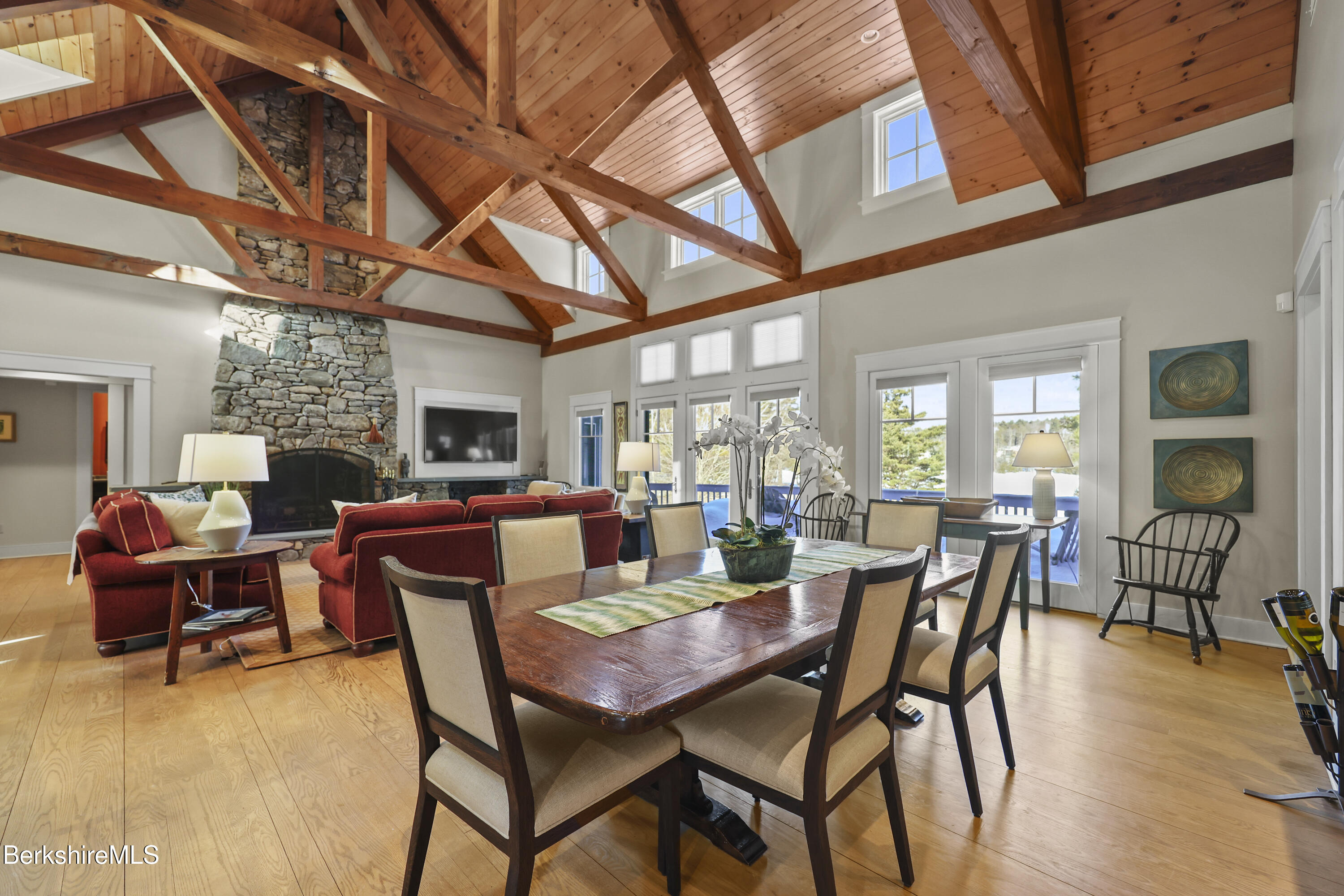 201 Stratford Road New Marlborough, MA 01259 - Photo 16 of 77 a view of a dining room with furniture window and wooden floor
