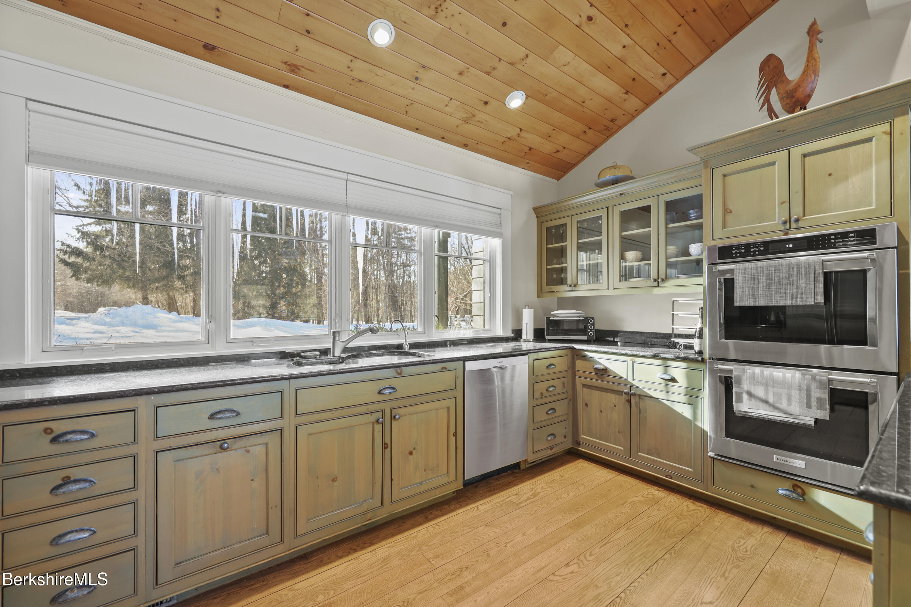 201 Stratford Road New Marlborough, MA 01259 - Photo 21 of 77 a kitchen with stainless steel appliances granite countertop a stove and a sink