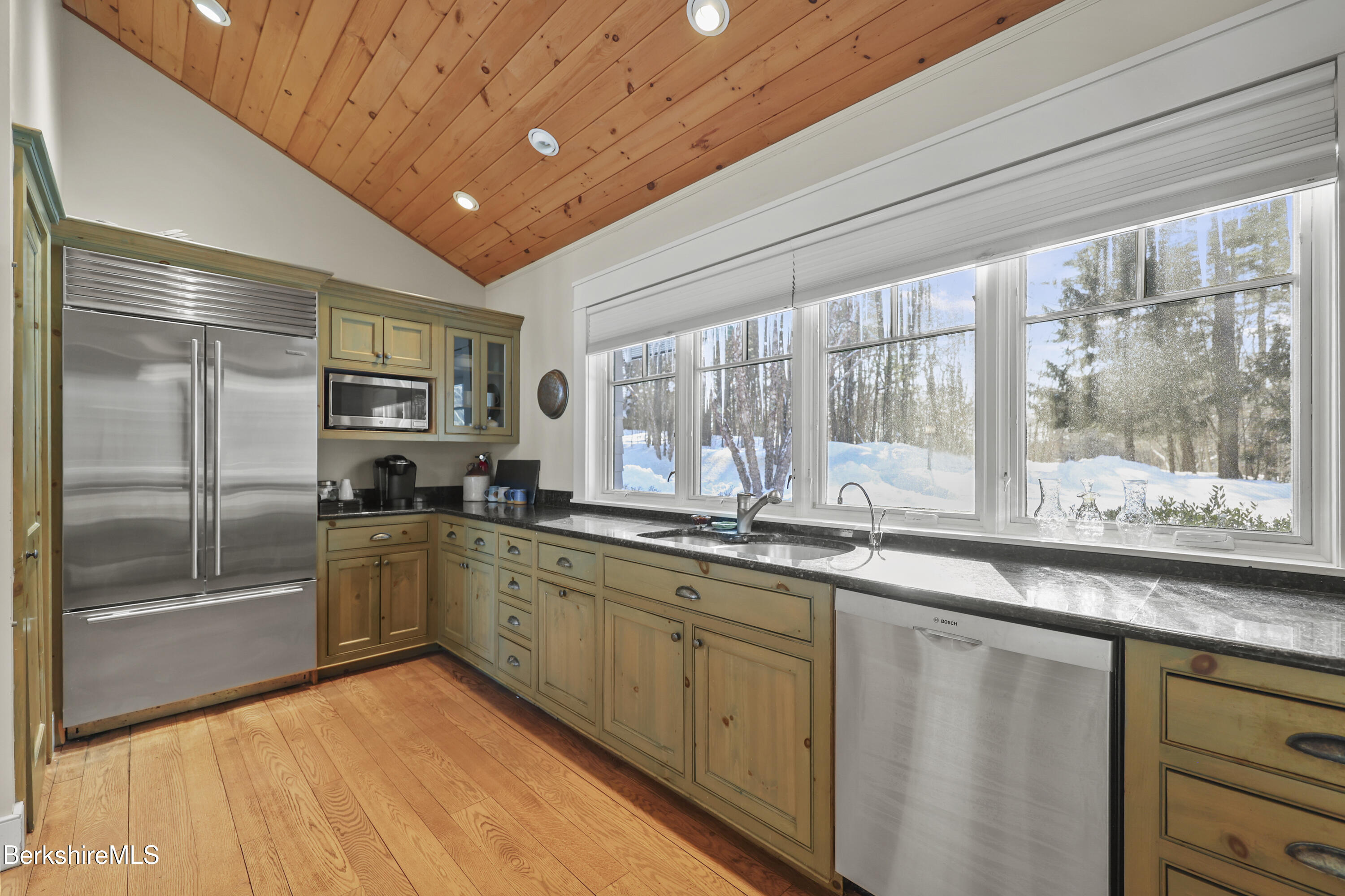 201 Stratford Road New Marlborough, MA 01259 - Photo 26 of 77 a large kitchen with stainless steel appliances granite countertop a sink window and refrigerator