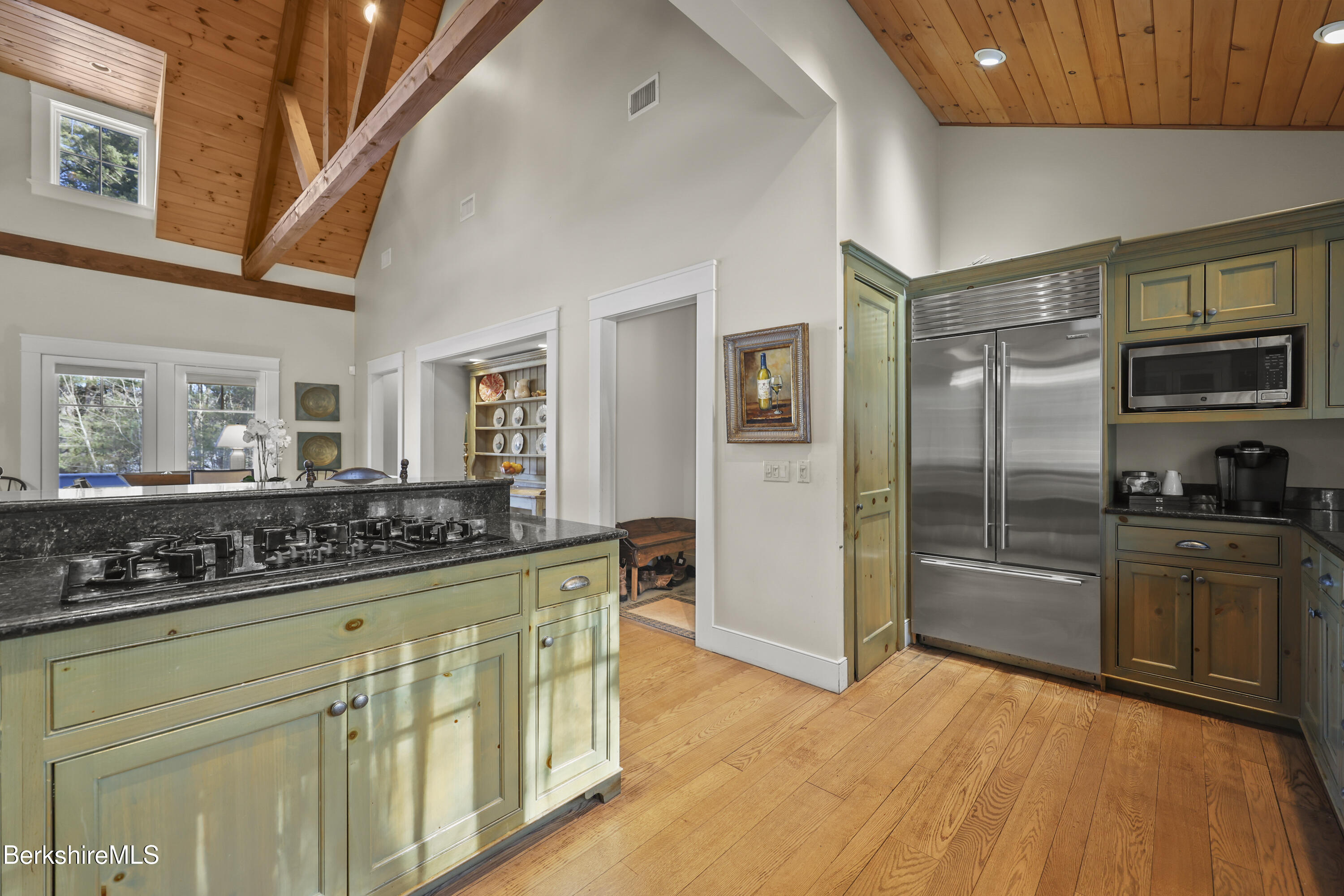 201 Stratford Road New Marlborough, MA 01259 - Photo 27 of 77 a kitchen with stainless steel appliances granite countertop a refrigerator and a stove top oven