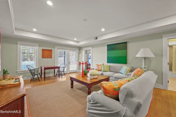 a view of a yard with trees in the background