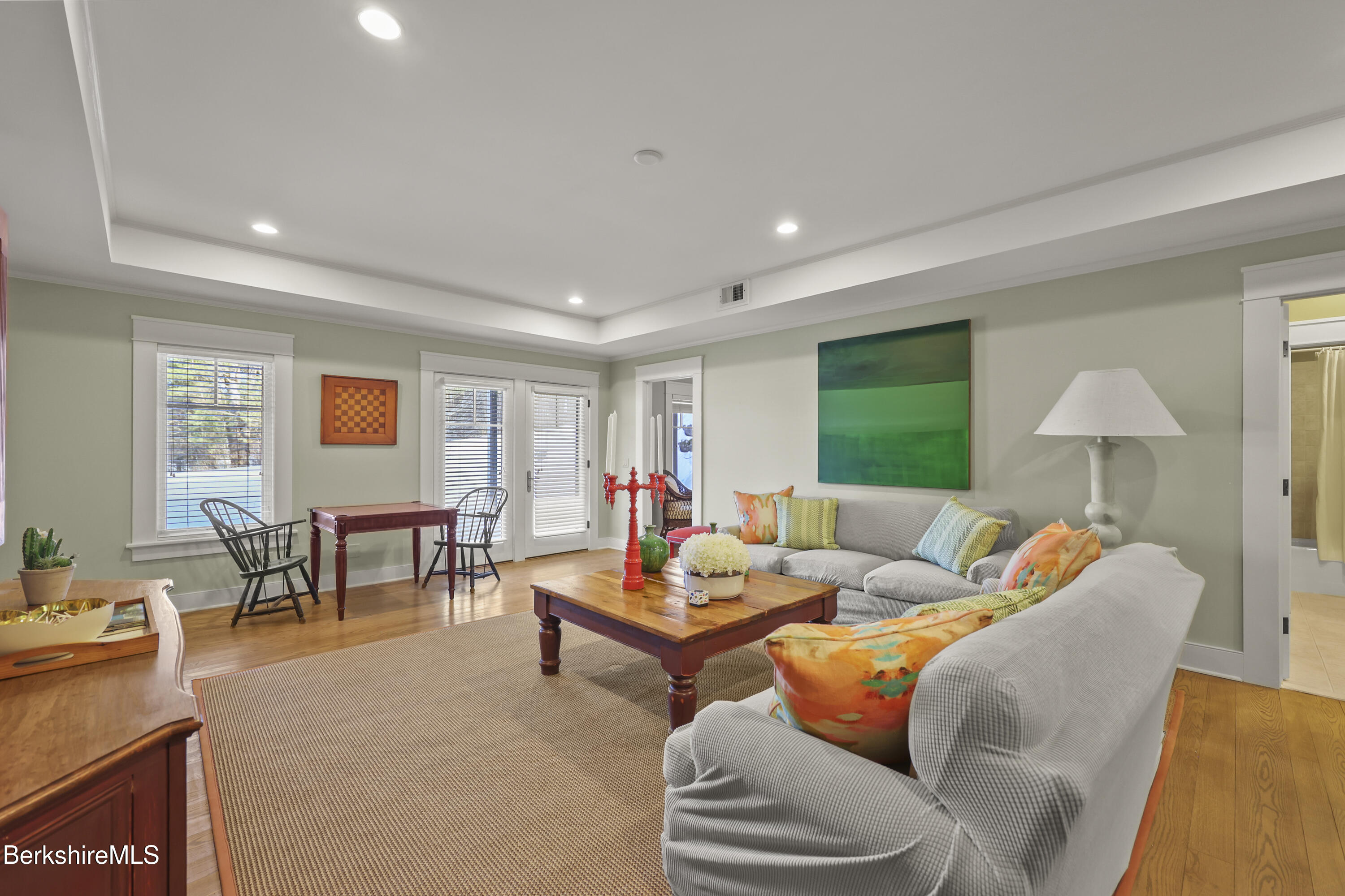 201 Stratford Road New Marlborough, MA 01259 - Photo 40 of 77 a living room with furniture a lamp and a window