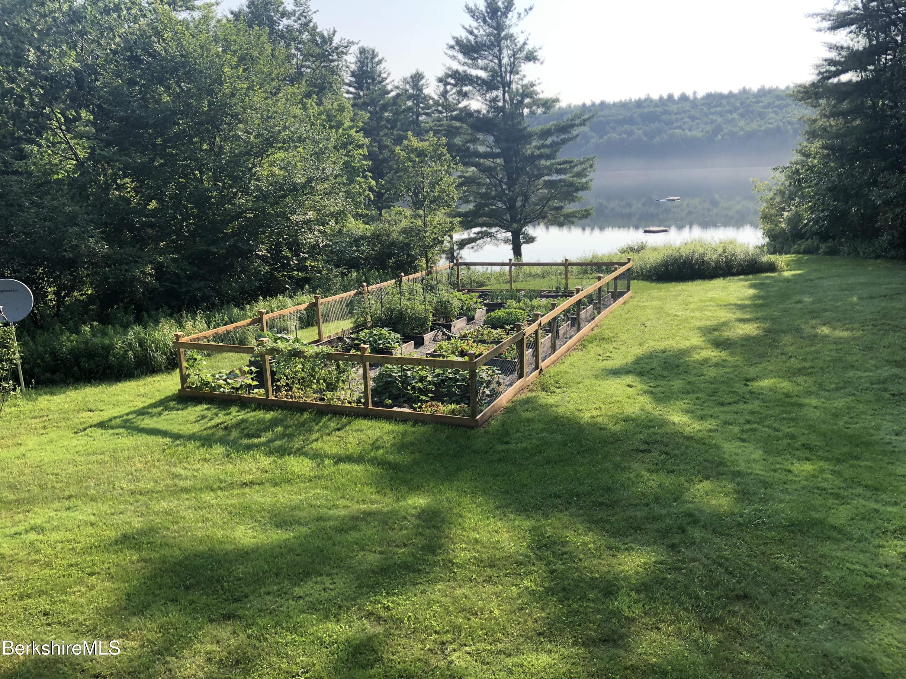 201 Stratford Road New Marlborough, MA 01259 - Photo 59 of 77 a view of an house with backyard and swimming pool
