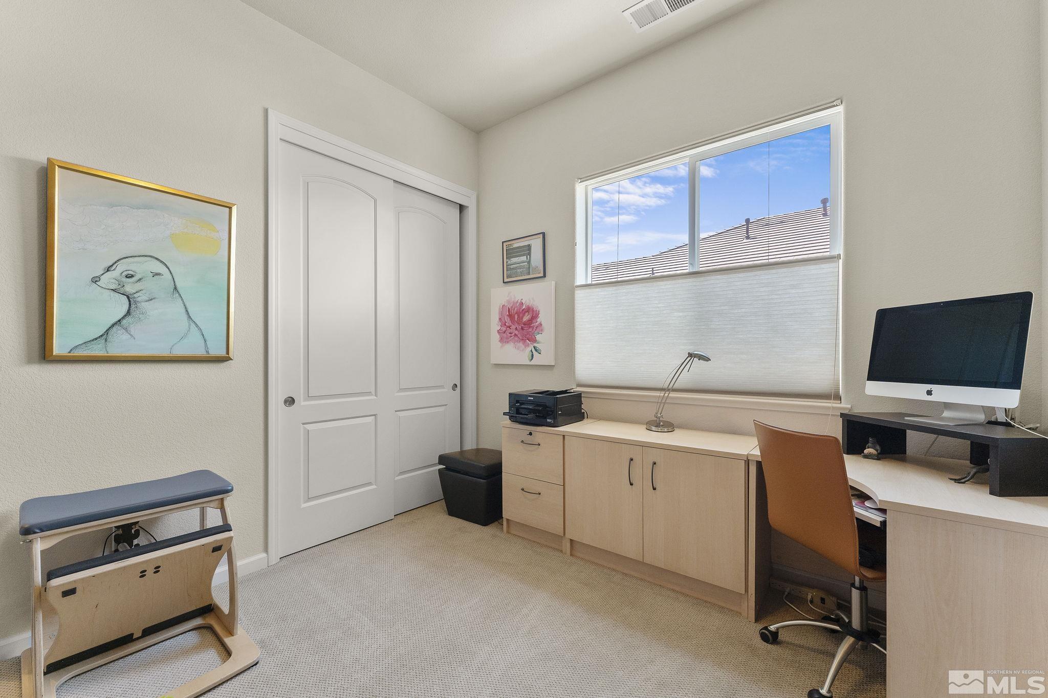 2601 Mule Circle Reno, NV 89521 - Photo 18 of 35 a room with a desk and chair