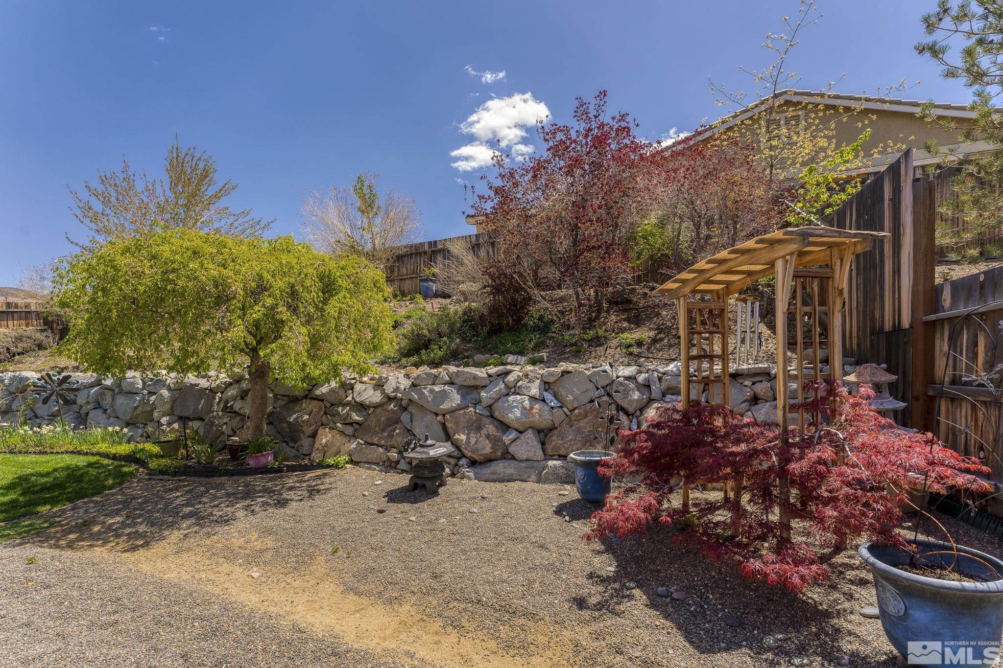 2601 Mule Circle Reno, NV 89521 - Photo 32 of 35 a view of a house with a yard