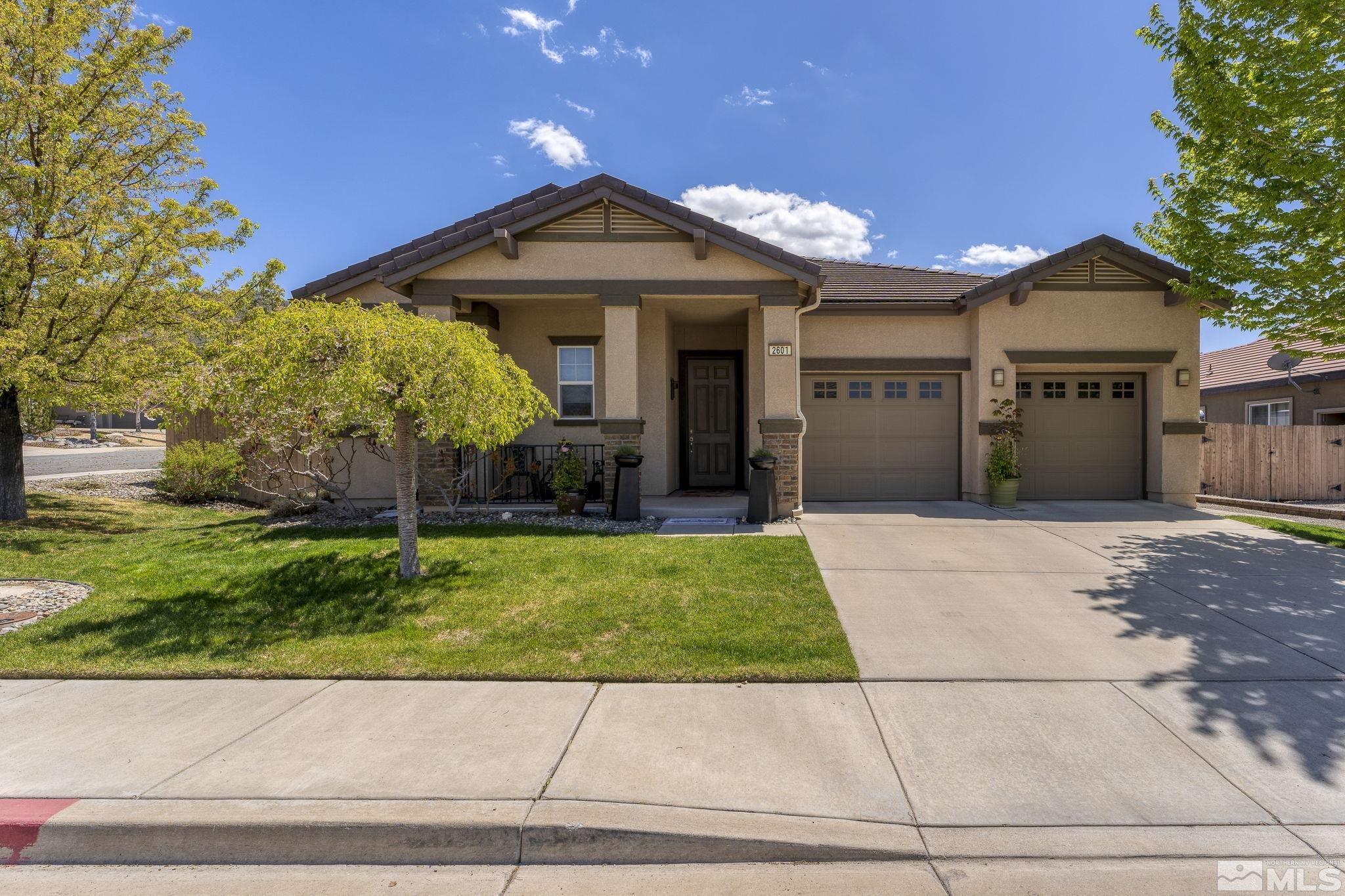 2601 Mule Circle Reno, NV 89521 - Photo 35 of 35 a front view of a house with a garden