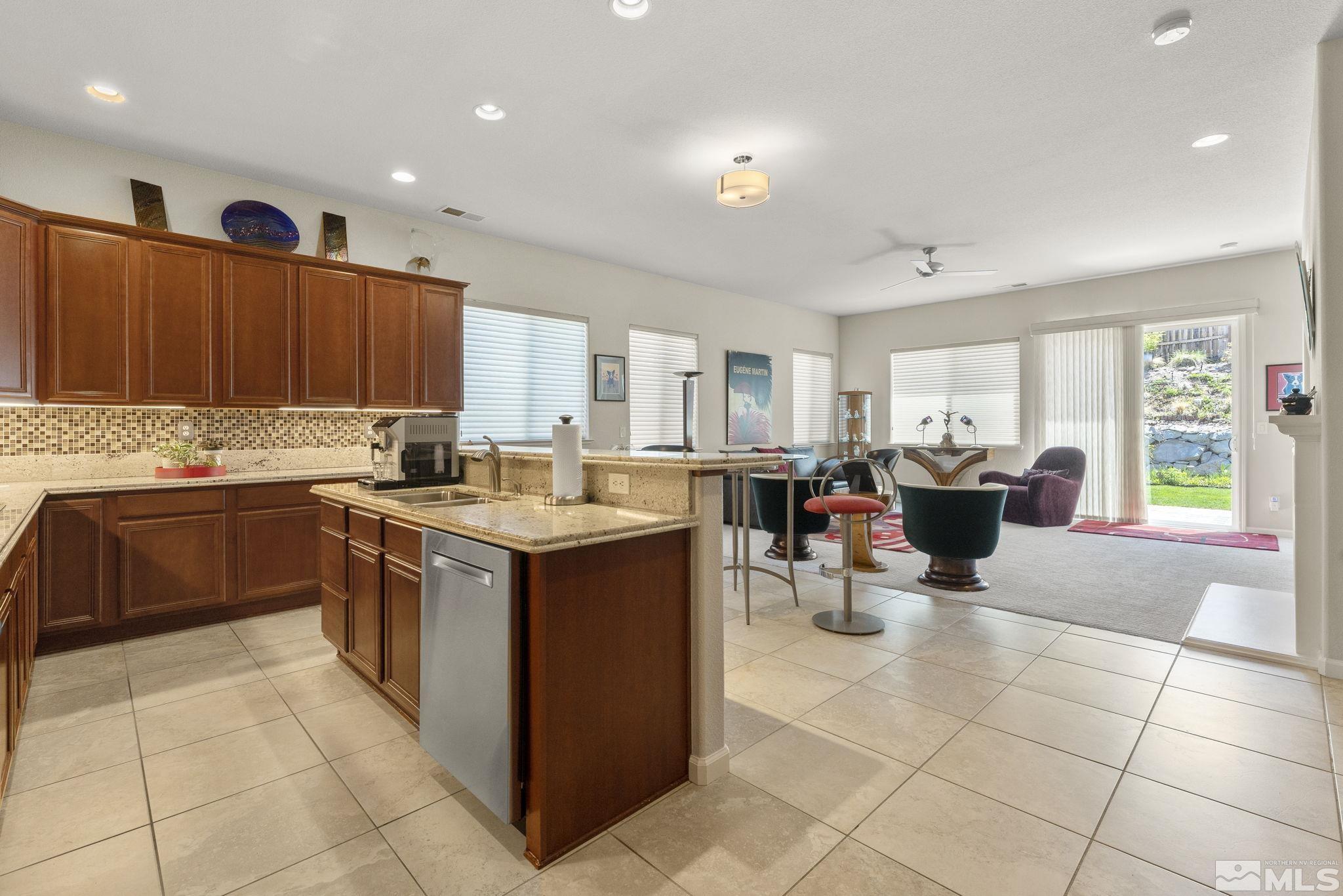 2601 Mule Circle Reno, NV 89521 - Photo 4 of 35 a kitchen with a sink counter top space and appliances