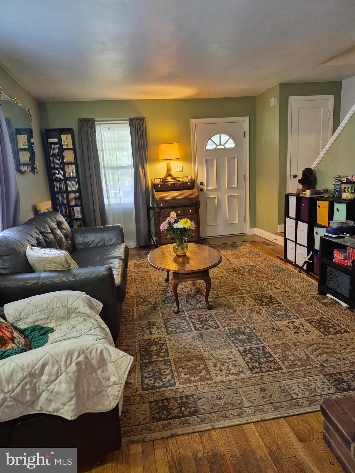 538 47th Street Baltimore, MD 21224 - Photo 2 of 20 a living room with furniture and a fireplace