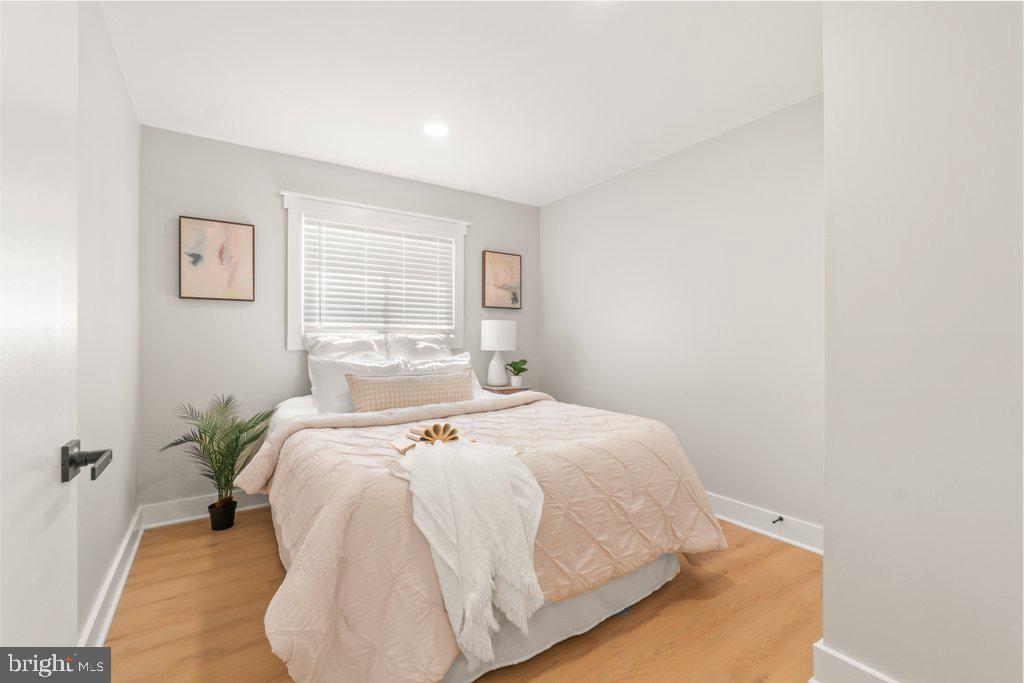 3500 Edwards Street Lanham, MD 20706 - Photo 23 of 40 a bedroom with a bed and a window