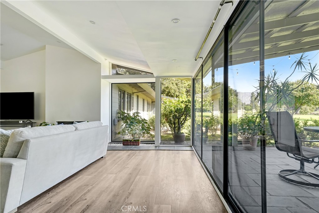 127 East Roses Road San Gabriel, CA 91775 - Photo 7 of 29 a living room with furniture and a flat screen tv