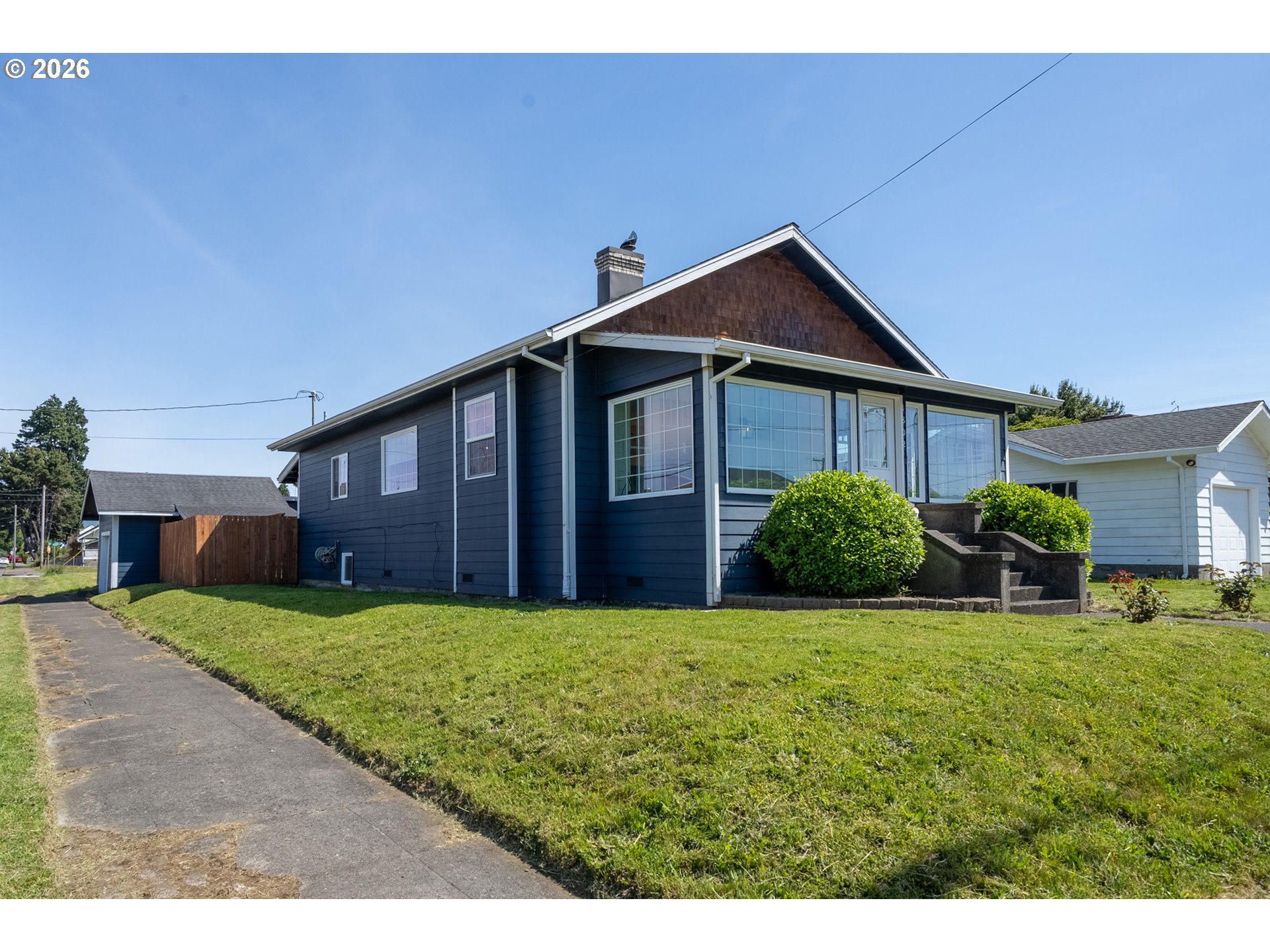 1802 8th Street Tillamook, OR 97141 - Photo 37 of 37 a view of a house with yard and porch