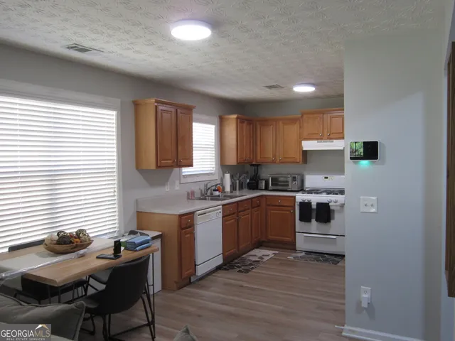 $399,500 | 5581 Ashmoore Court, Flowery Branch, GA 30542