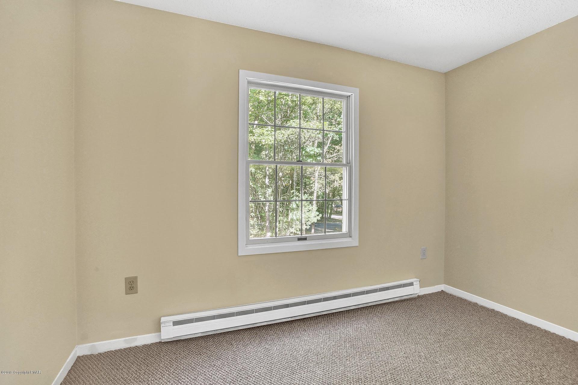 295 Sundance Road Effort, PA 18330 - Photo 14 of 25 an empty room with a window