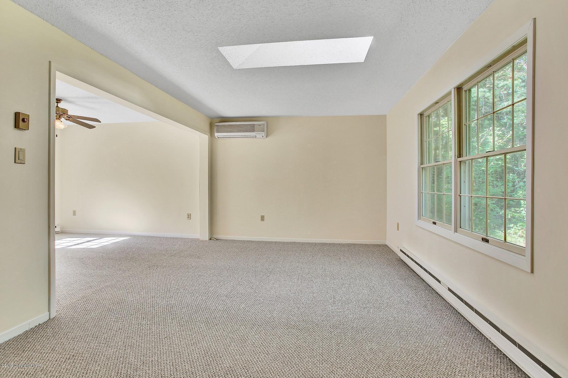 295 Sundance Road Effort, PA 18330 - Photo 3 of 25 a view of an empty room with a window