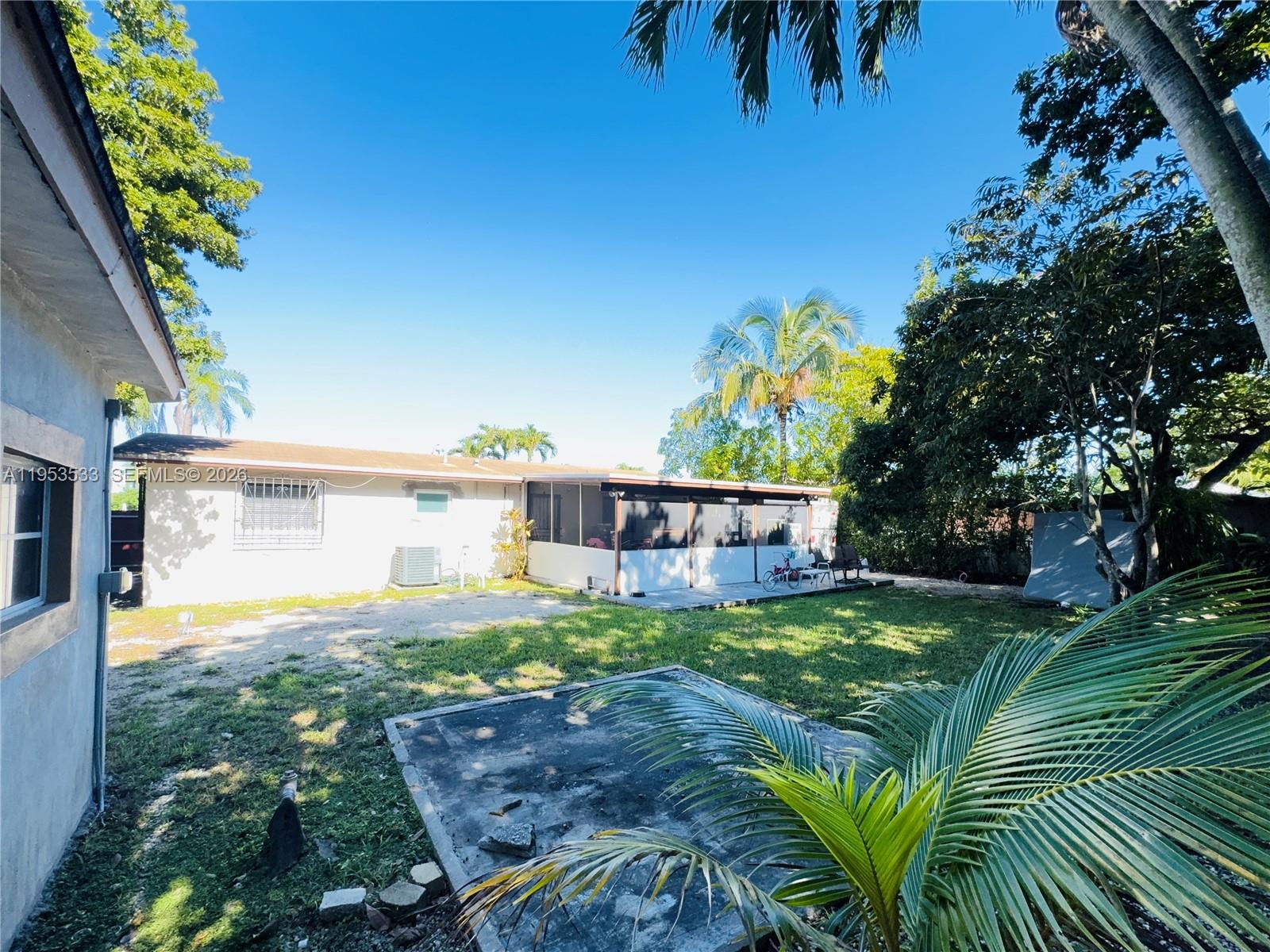 11510 Southwest 191st Terrace Miami, FL 33157 - Photo 15 of 15 a view of a backyard with a garden