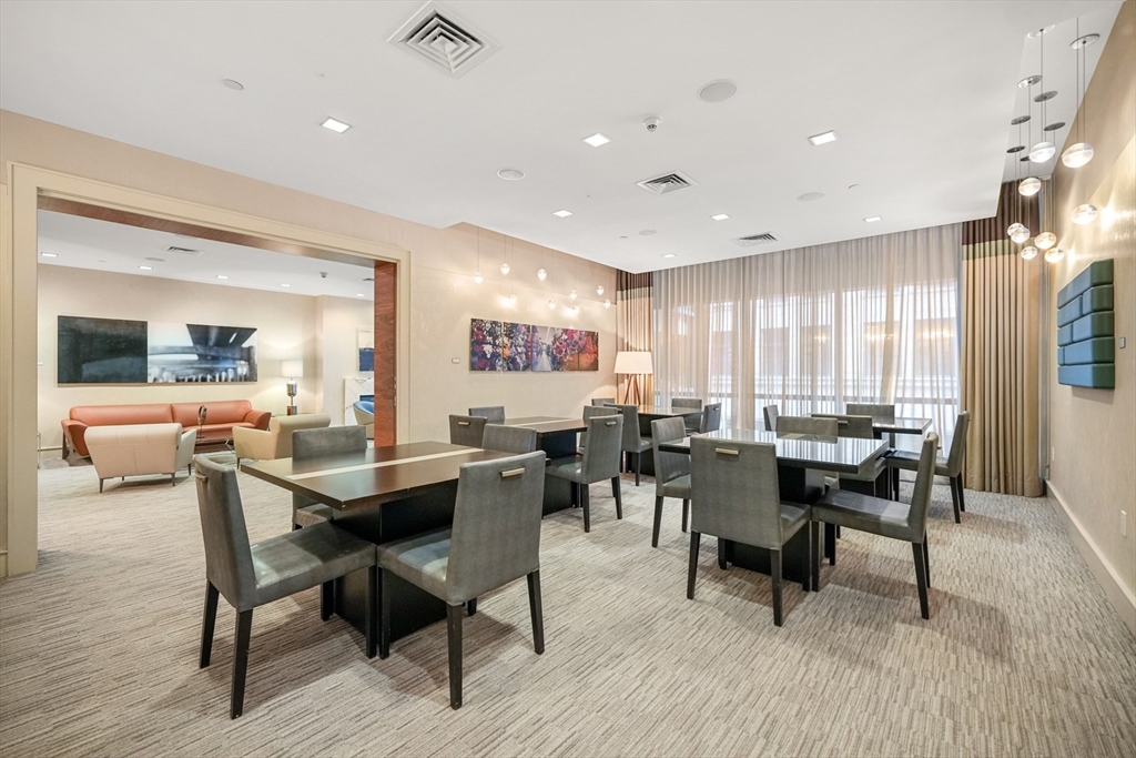 45 Province Street, Unit 1903 Boston, MA 02108 - Photo 17 of 31 a view of a dining area with furniture