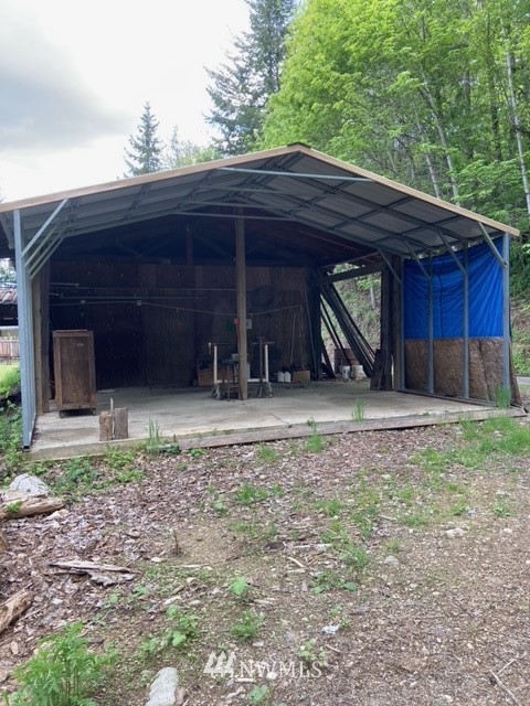 0 Boyd Road Randle, WA 98377 - Photo 2 of 8 a front view of a house with a yard