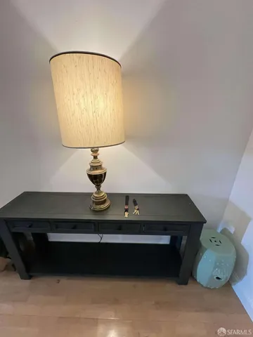 a room with a table and a mirror