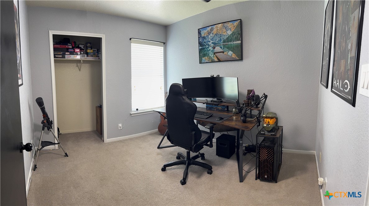 1817 Dusk Drive Killeen, TX 76543 - Photo 17 of 23 a view of a workspace with furniture and a window