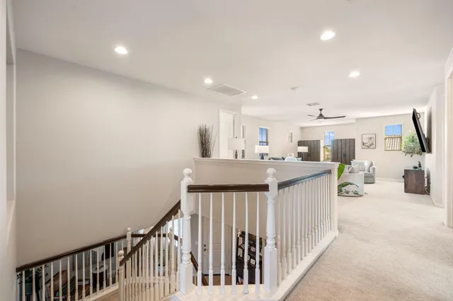 a bedroom with bed and window