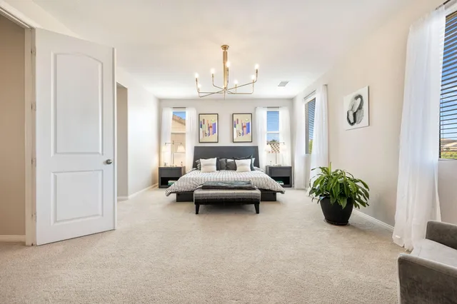 a bathroom with a sink double vanity granite tub and shower
