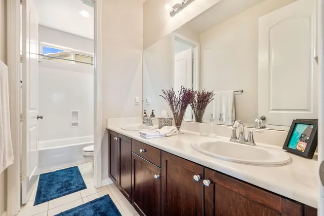 a view of an house with backyard space and garden