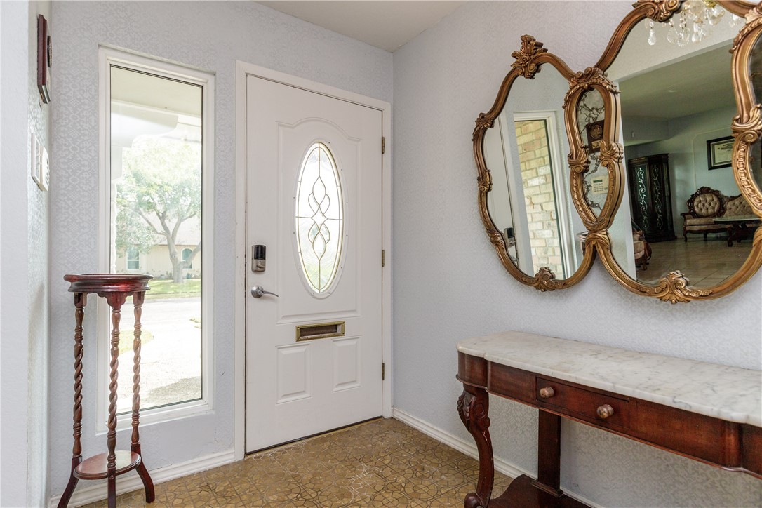 4401 Bluefield Drive Corpus Christi, TX 78413 - Photo 11 of 25 a view of a livingroom with furniture and a mirror