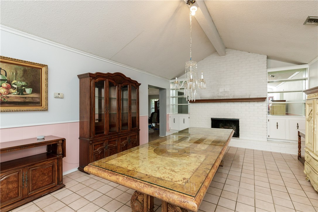 4401 Bluefield Drive Corpus Christi, TX 78413 - Photo 21 of 25 a spacious bathroom with a granite countertop sink a mirror and a shower