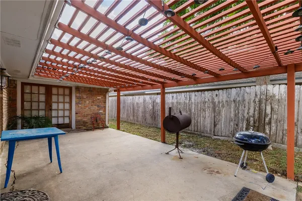a room with furniture and a wooden door