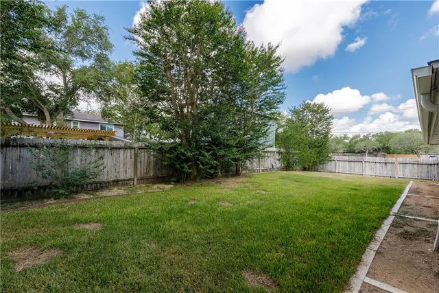 a view of a backyard with a garden