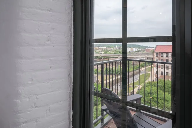 a view of a glass door of the house