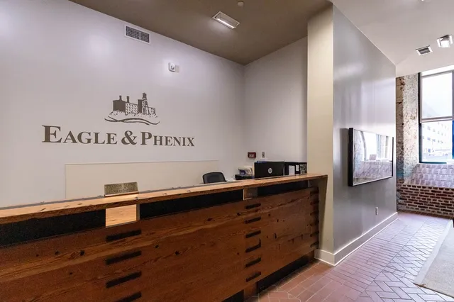 a kitchen with a table and cabinets