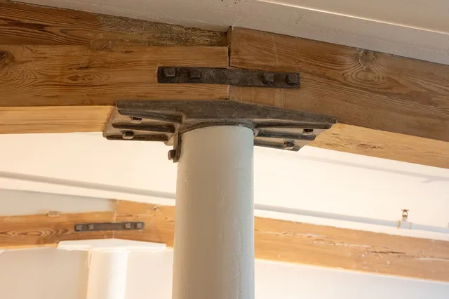 a bathroom with double sink and a mirror